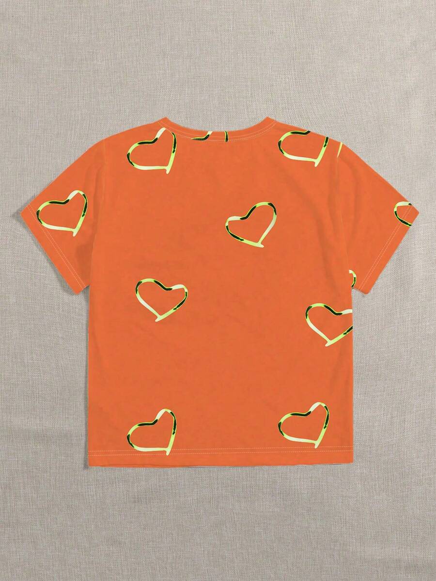Oranje T-shirt voor dames met hartvormige print