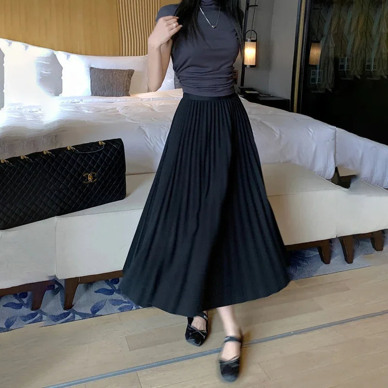 Elvya – elegante geplooide midi-rok