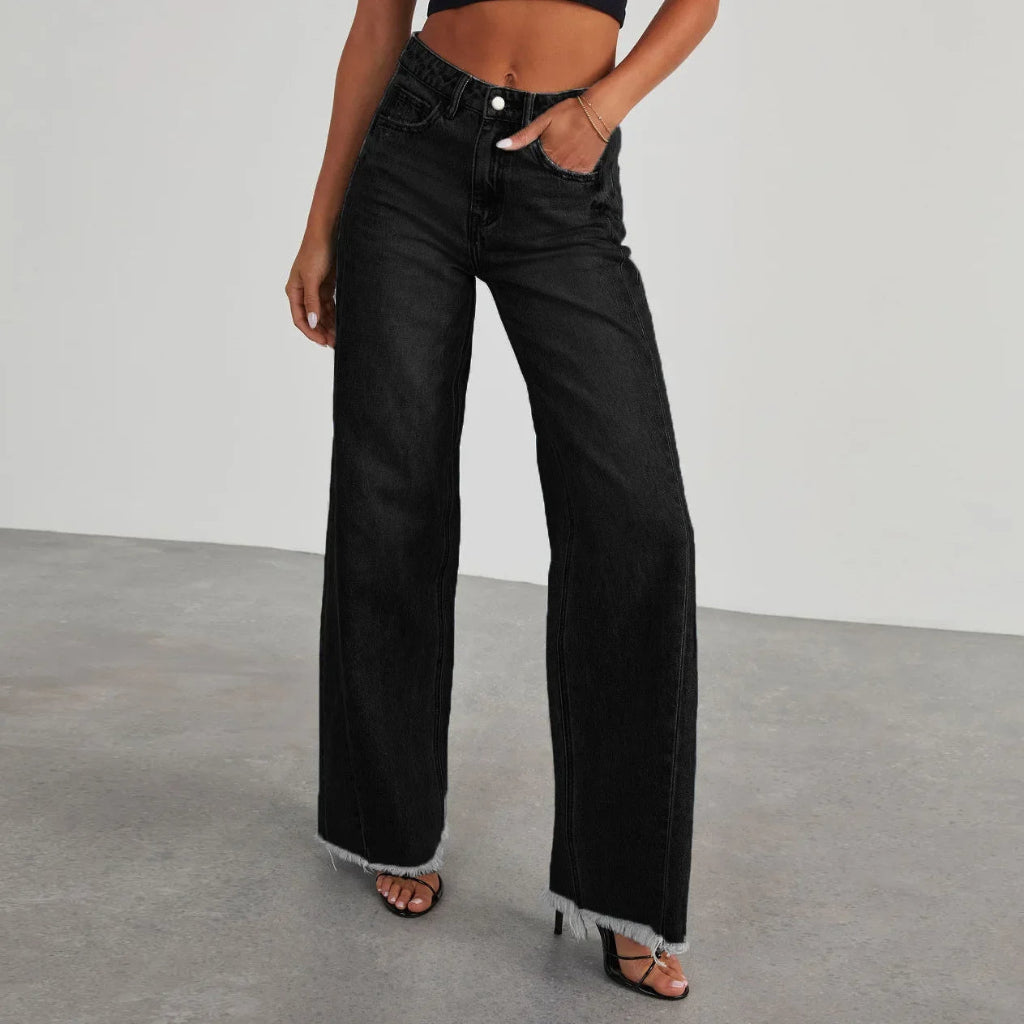 Niva - Loose fit jeans met rafelzoom Dames