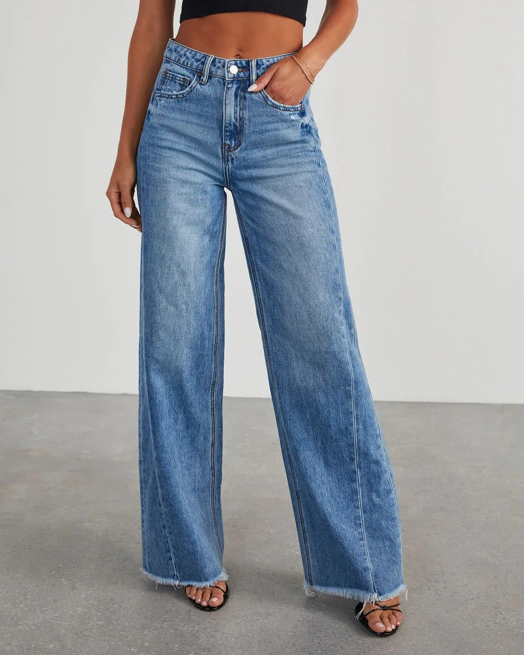 Niva - Loose fit jeans met rafelzoom Dames