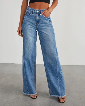 Niva - Loose fit jeans met rafelzoom Dames