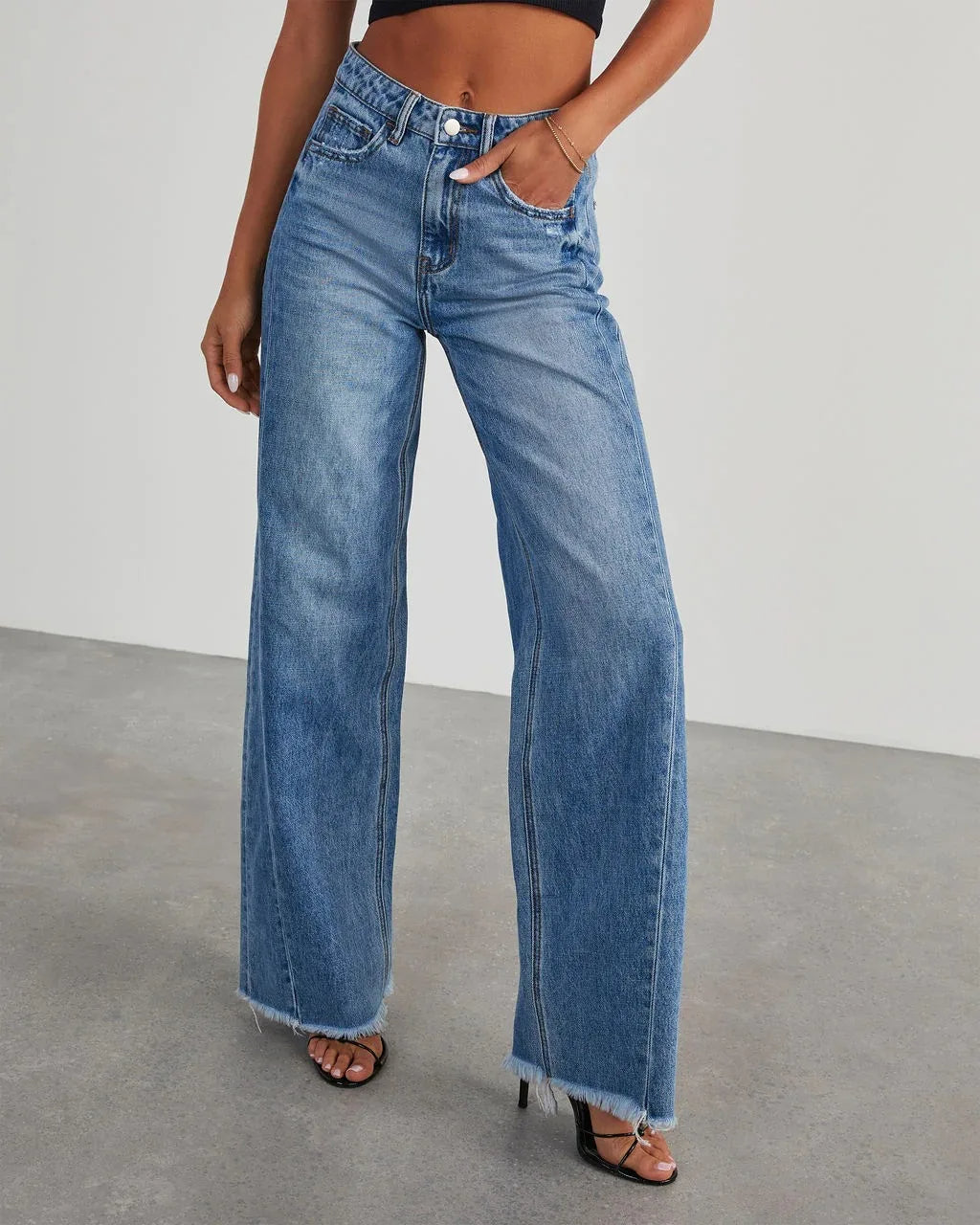 Niva - Loose fit jeans met rafelzoom Dames