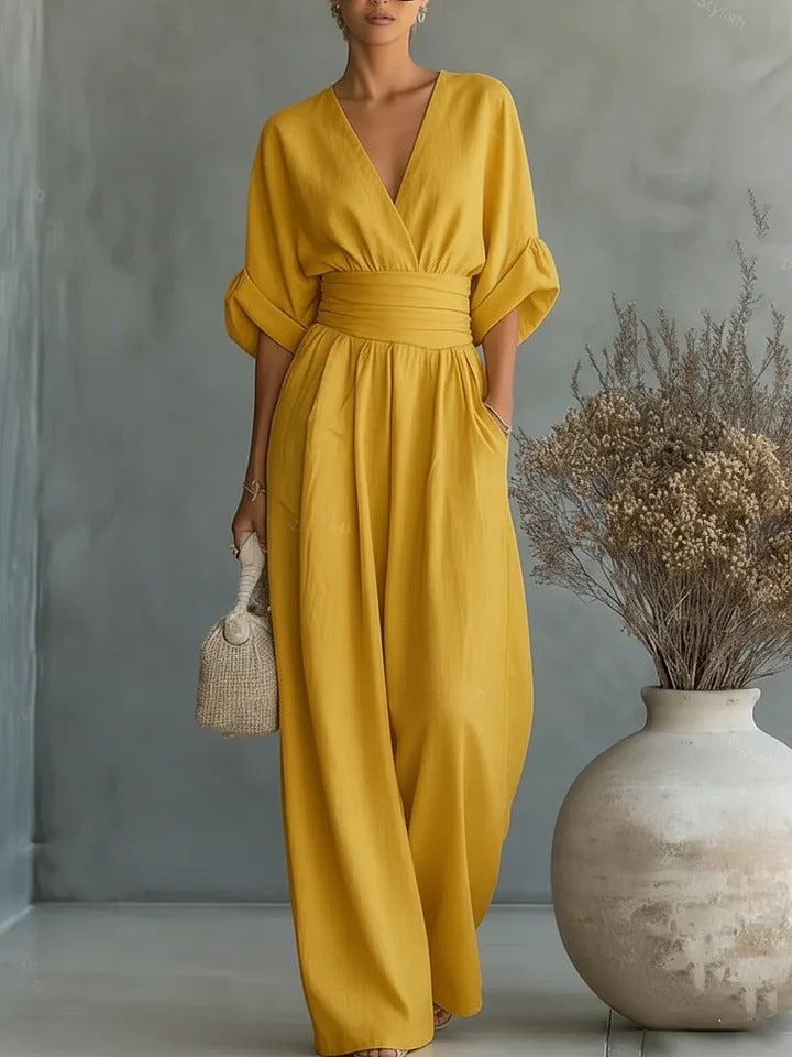 Elegante damesjumpsuit met wijde pijpen, V-hals en vloeiende pasvorm