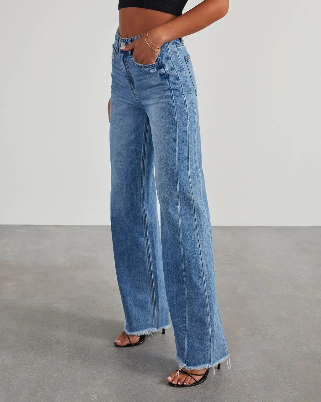 Loose fit jeans met rafelzoom Dames
