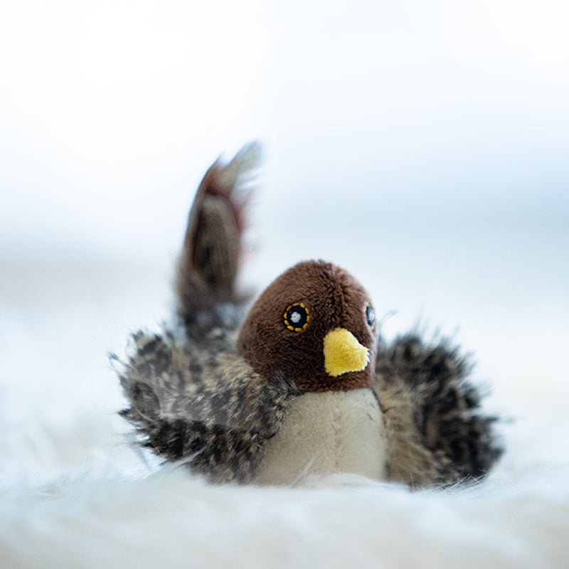 Decoratieve vogel met tjilpgeluid
