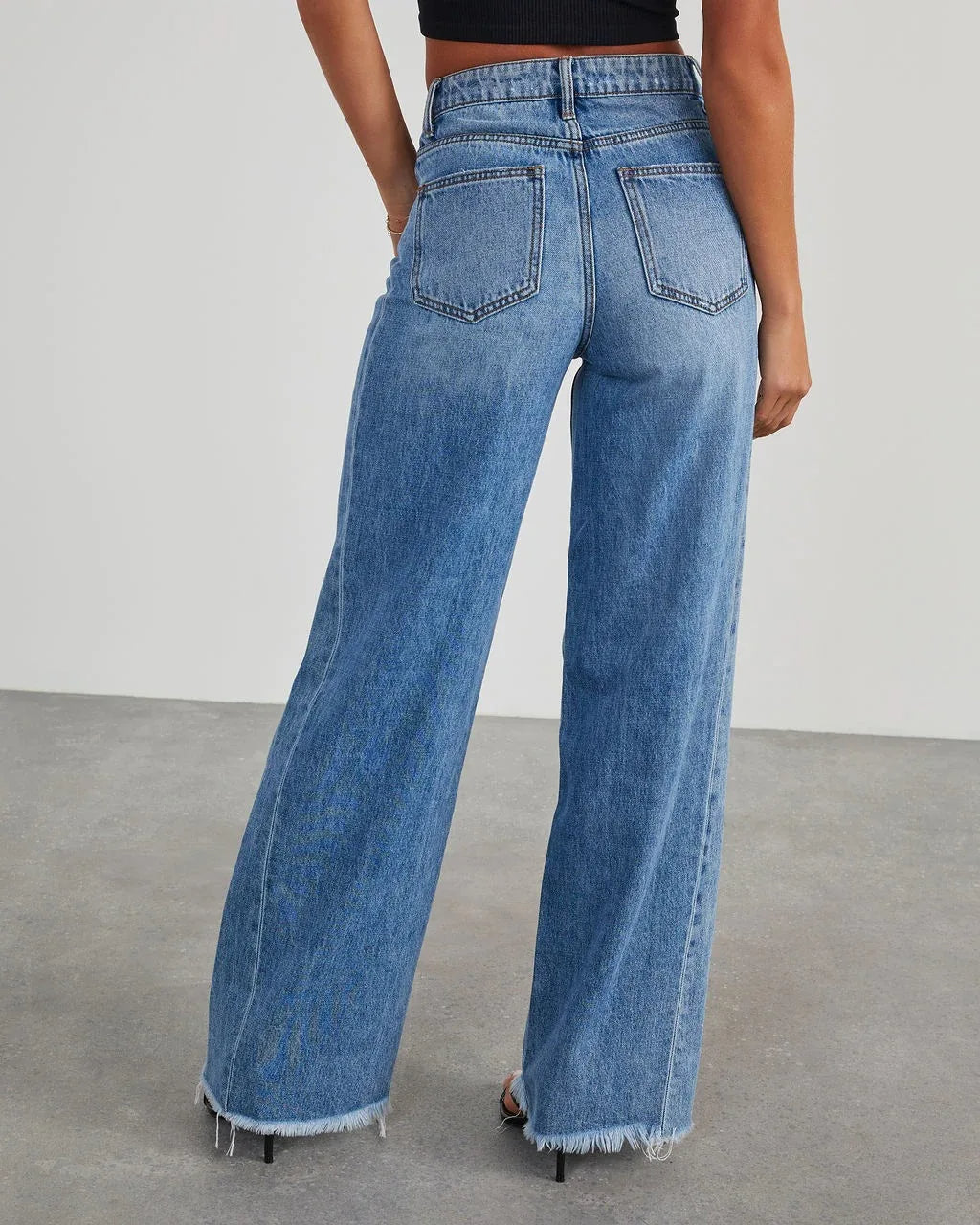 Niva - Loose fit jeans met rafelzoom Dames