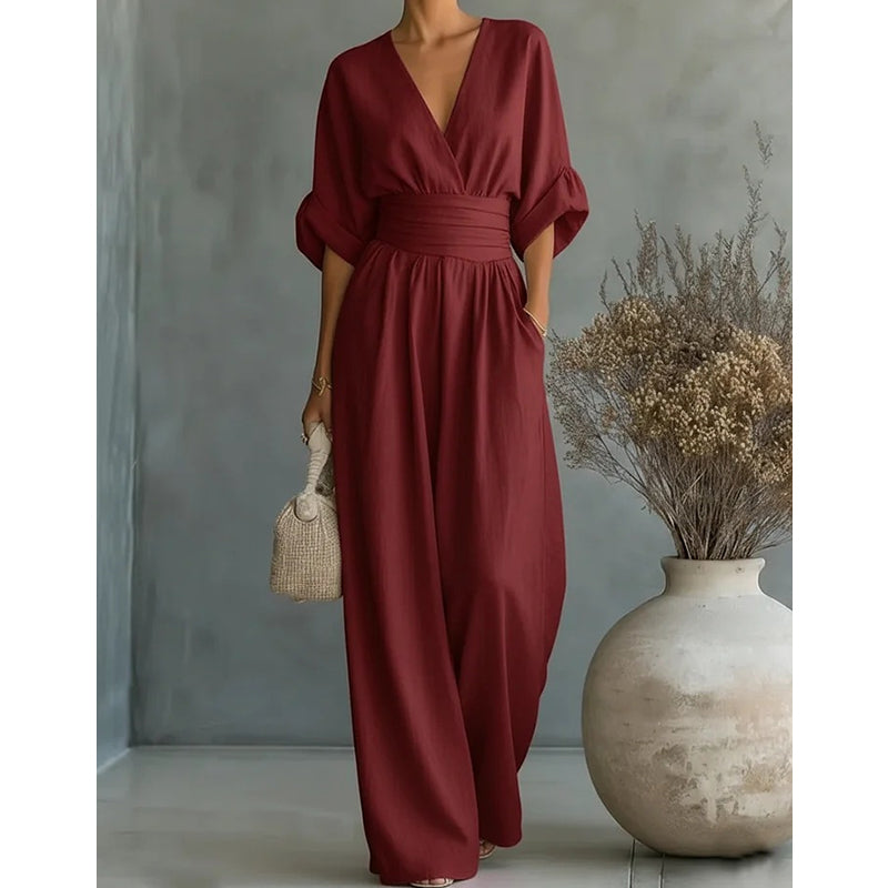 Elegante damesjumpsuit met wijde pijpen, V-hals en vloeiende pasvorm
