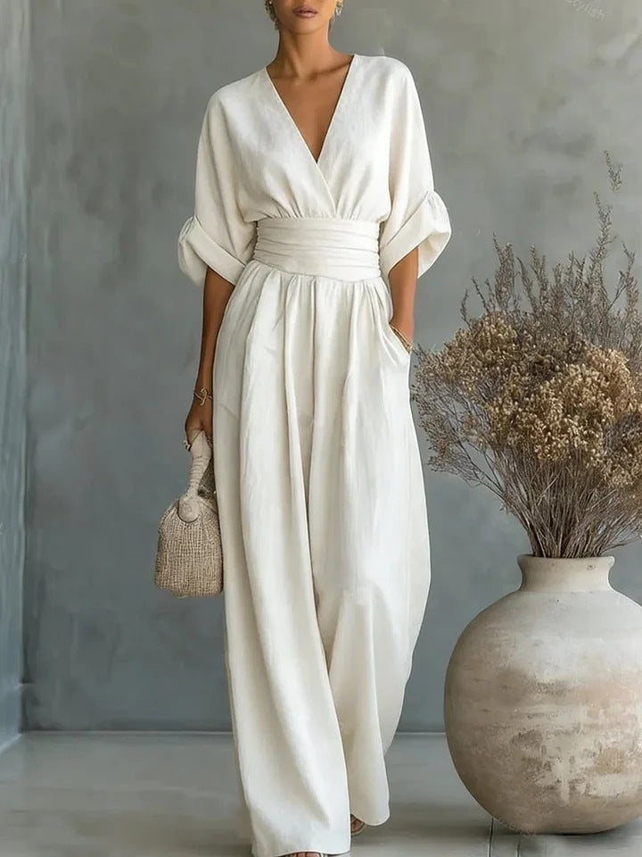 Elegante damesjumpsuit met V-hals en wijd uitlopende pijpen met hoge taille