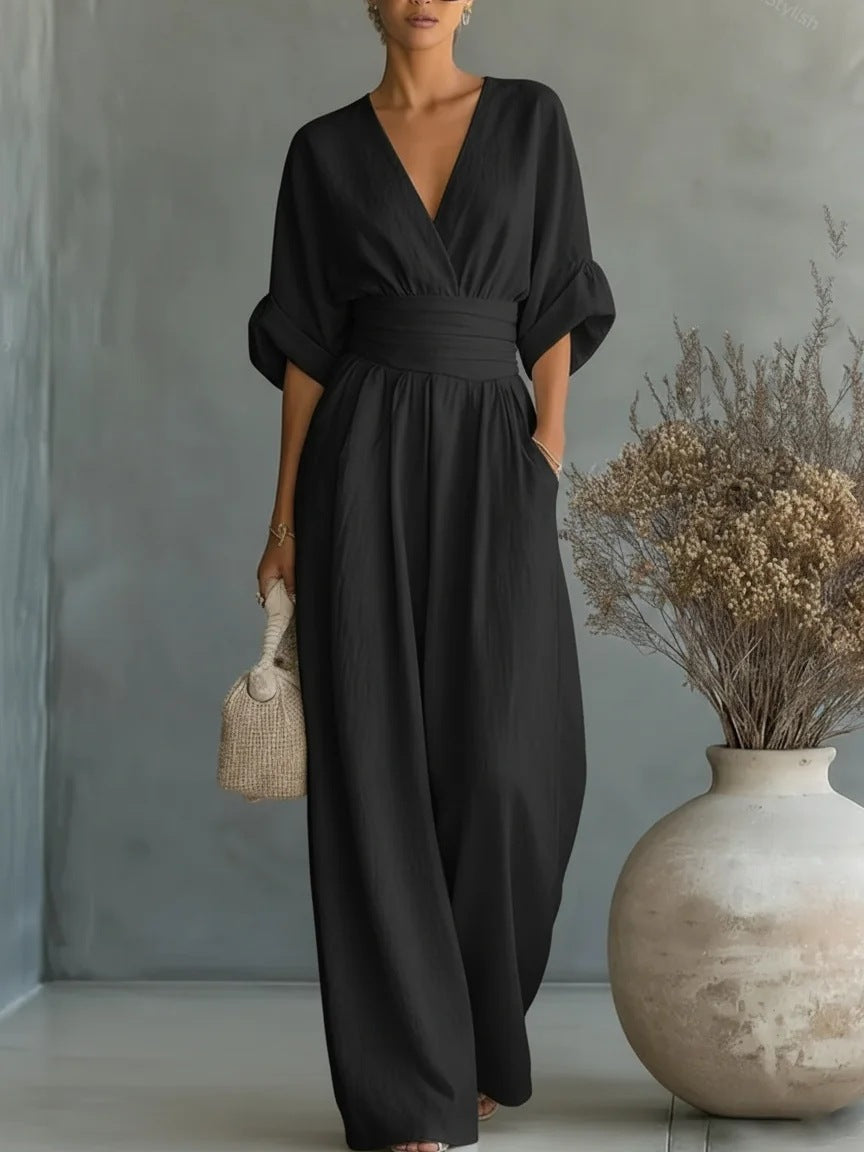 Elegante damesjumpsuit met wijde pijpen, V-hals en vloeiende pasvorm