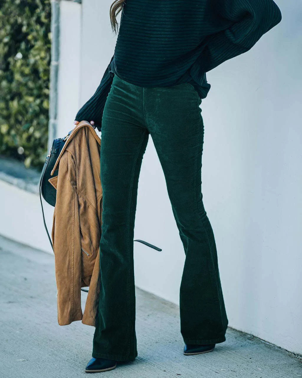 Voorkant groene flare pants voor dames