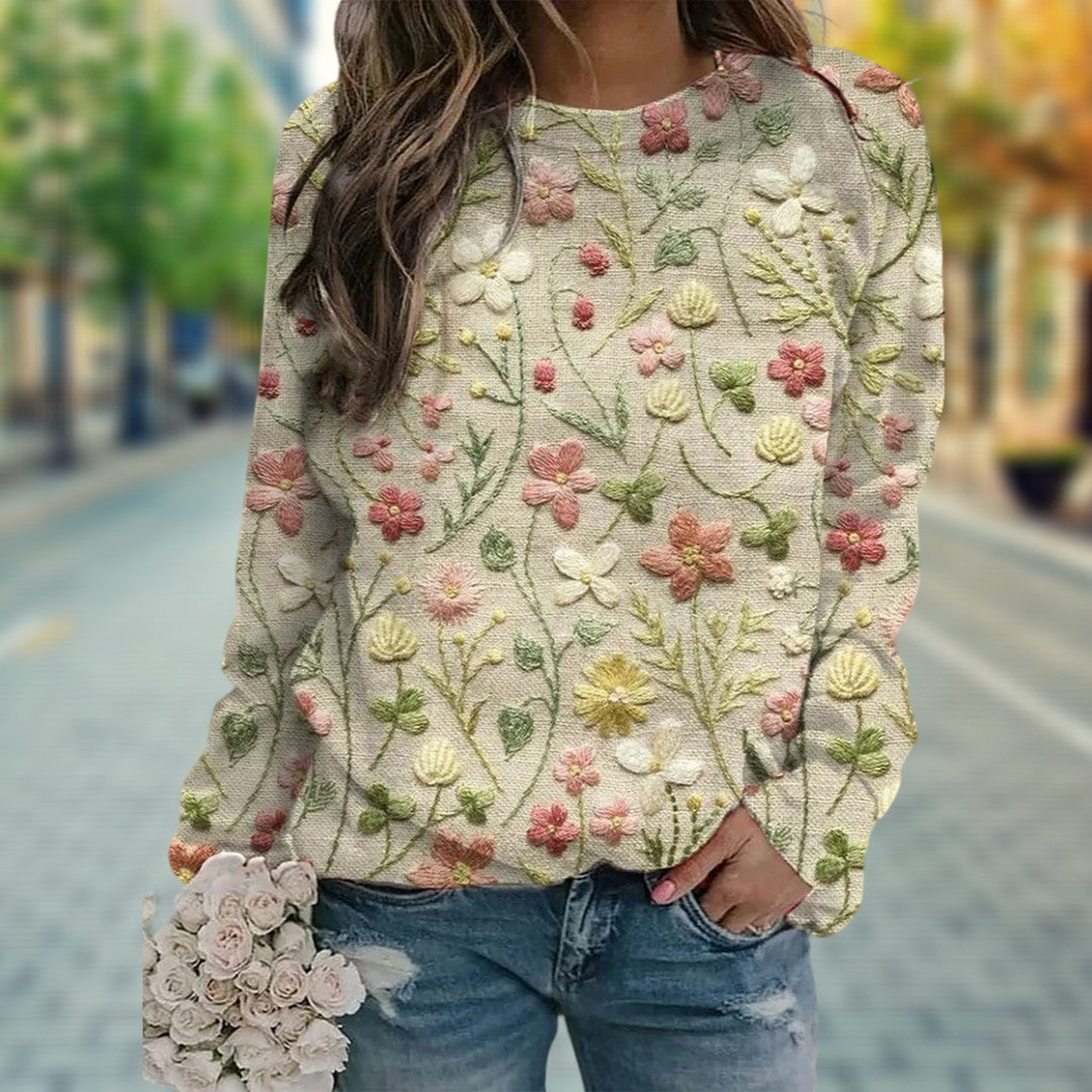 Deze trui is ontworpen voor vrouwen die op zoek zijn naar een frisse, bloemrijke look die moeiteloos elegantie uitstraalt.