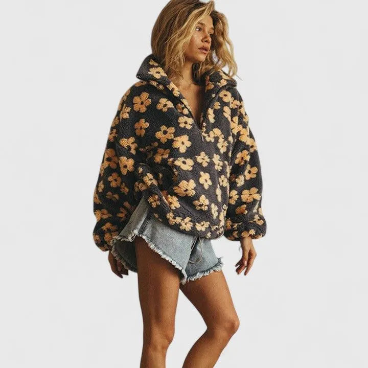 Briony fleece damestrui met bloemenprint en halve rits