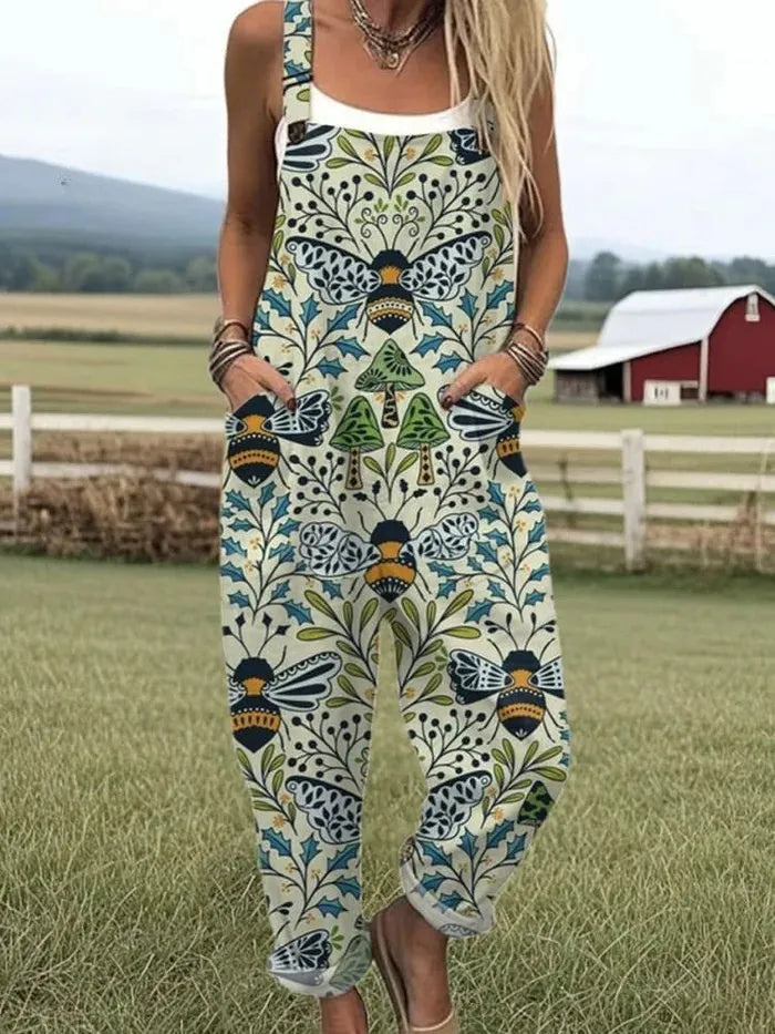 Calliope mouwloze damesjumpsuit in tuinbroekstijl met bijenprint
