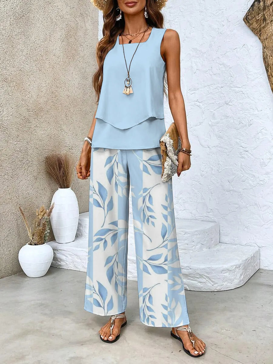 Corinne tweedelige damesset met bloemenprint en wijde broek