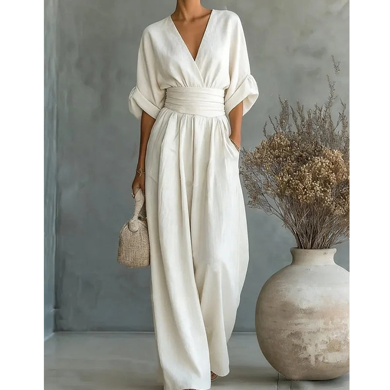 Elegante damesjumpsuit met wijde pijpen, V-hals en vloeiende pasvorm