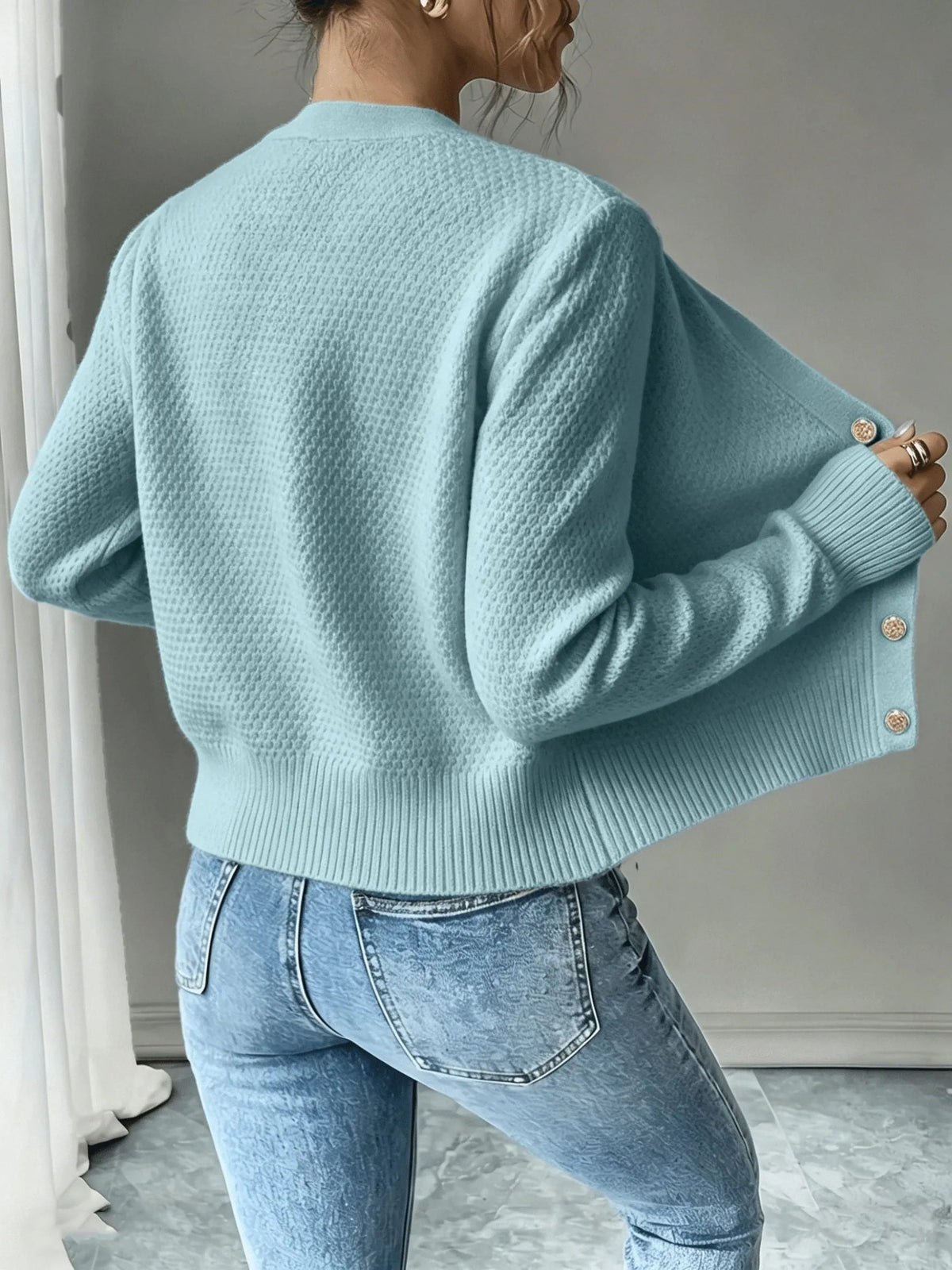 Damaris kabelgebreid damesvest met knoopsluiting