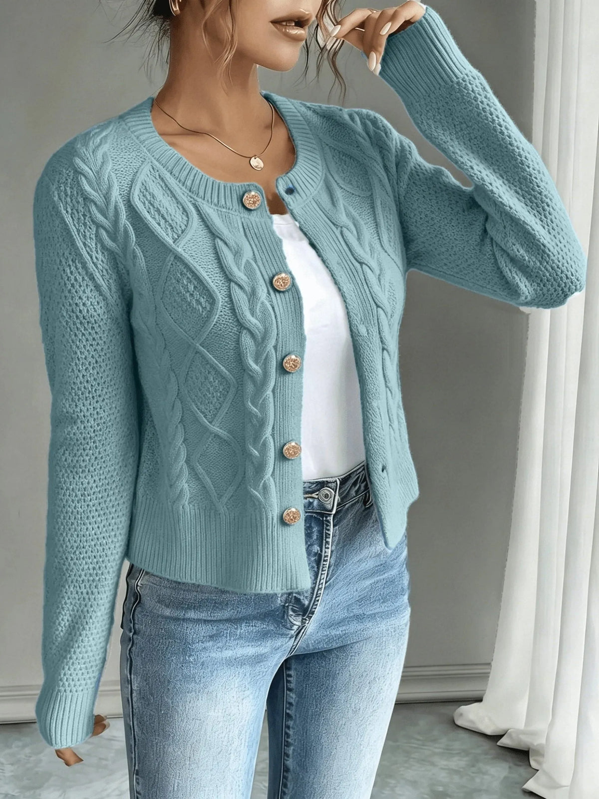 Damaris kabelgebreid damesvest met knoopsluiting