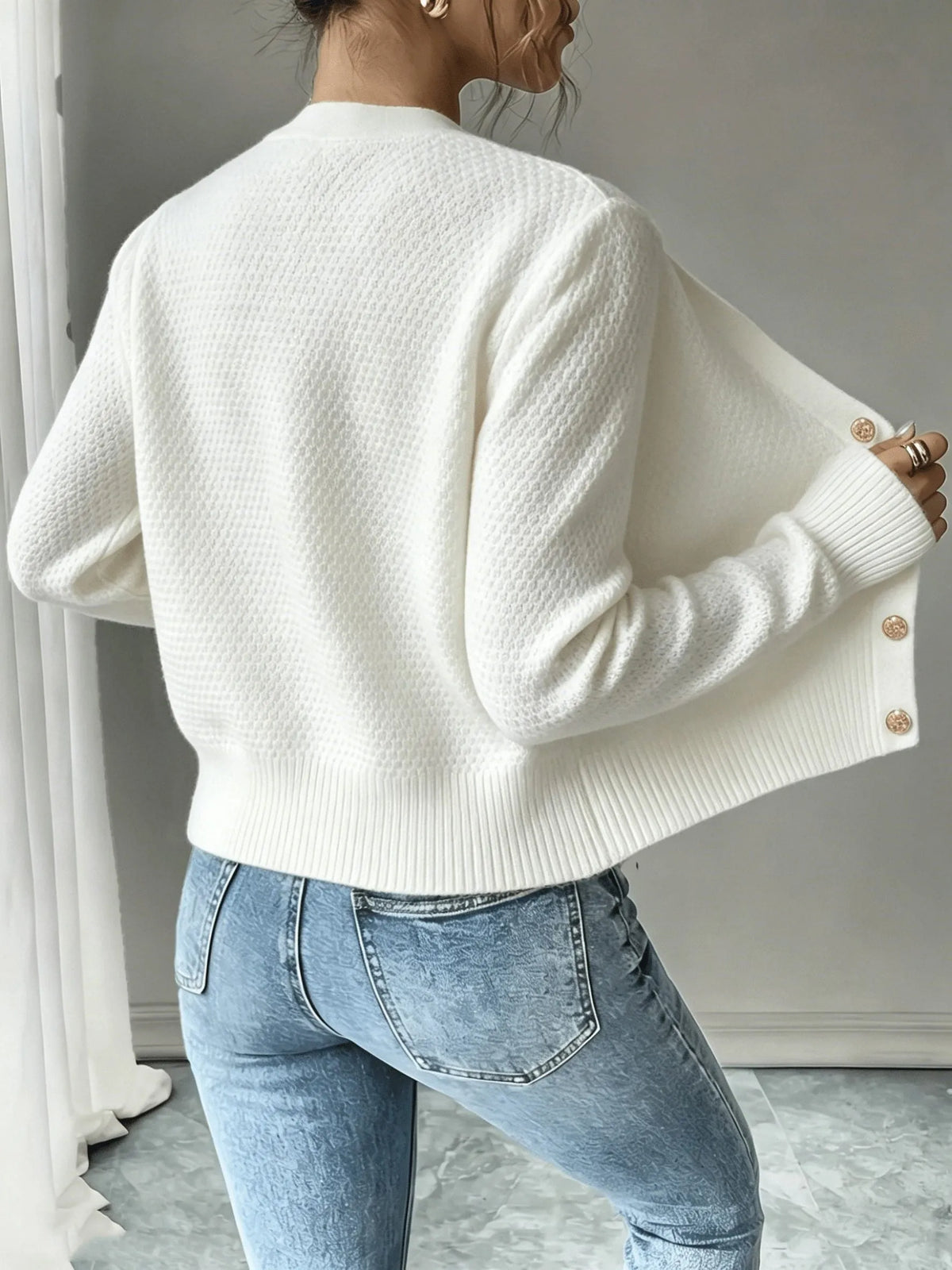 Damaris kabelgebreid damesvest met knoopsluiting
