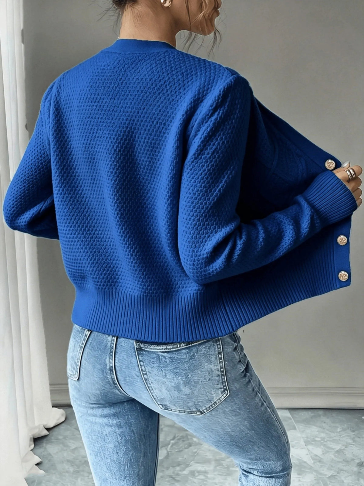 Damaris kabelgebreid damesvest met knoopsluiting