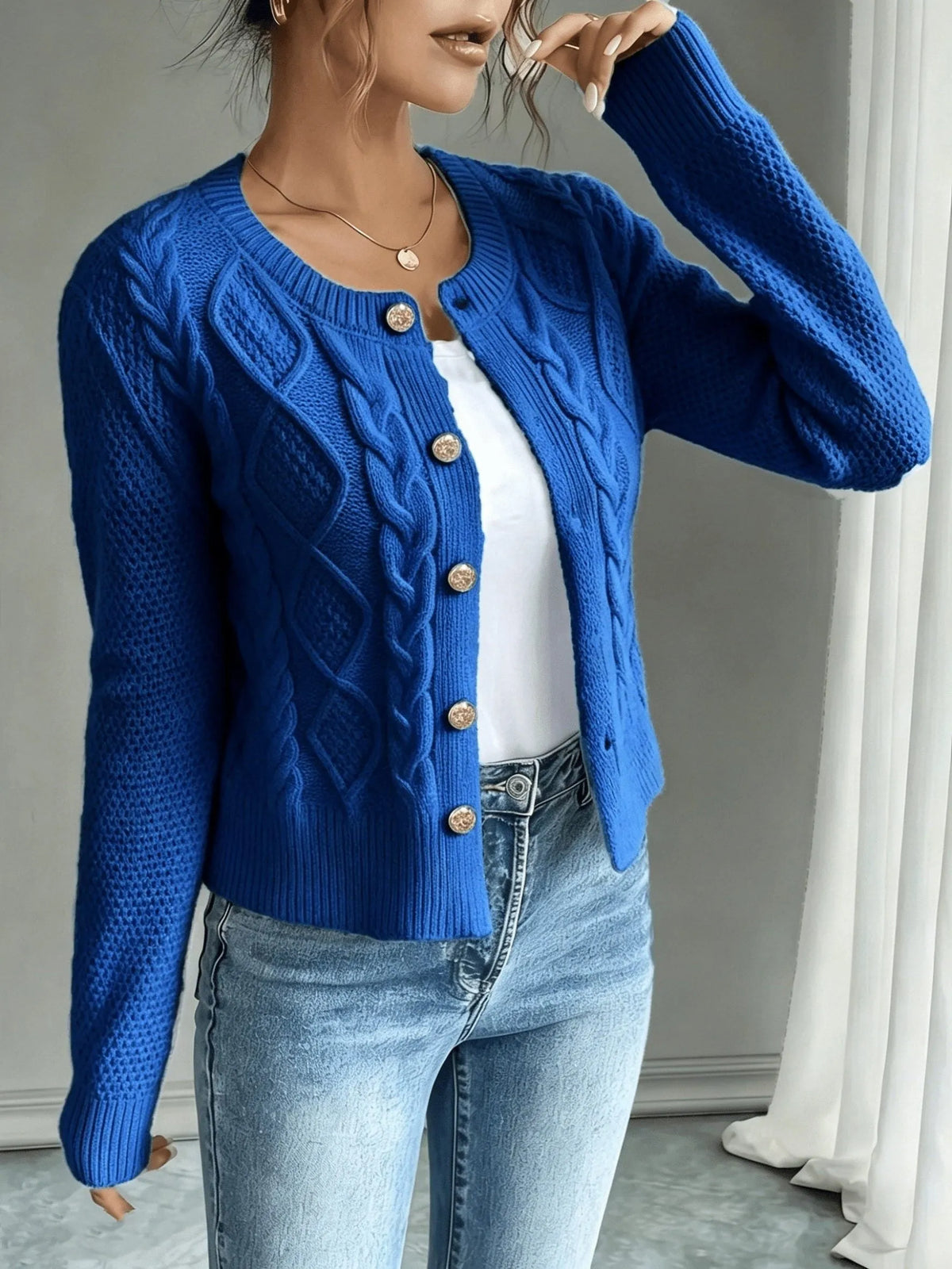 Damaris kabelgebreid damesvest met knoopsluiting