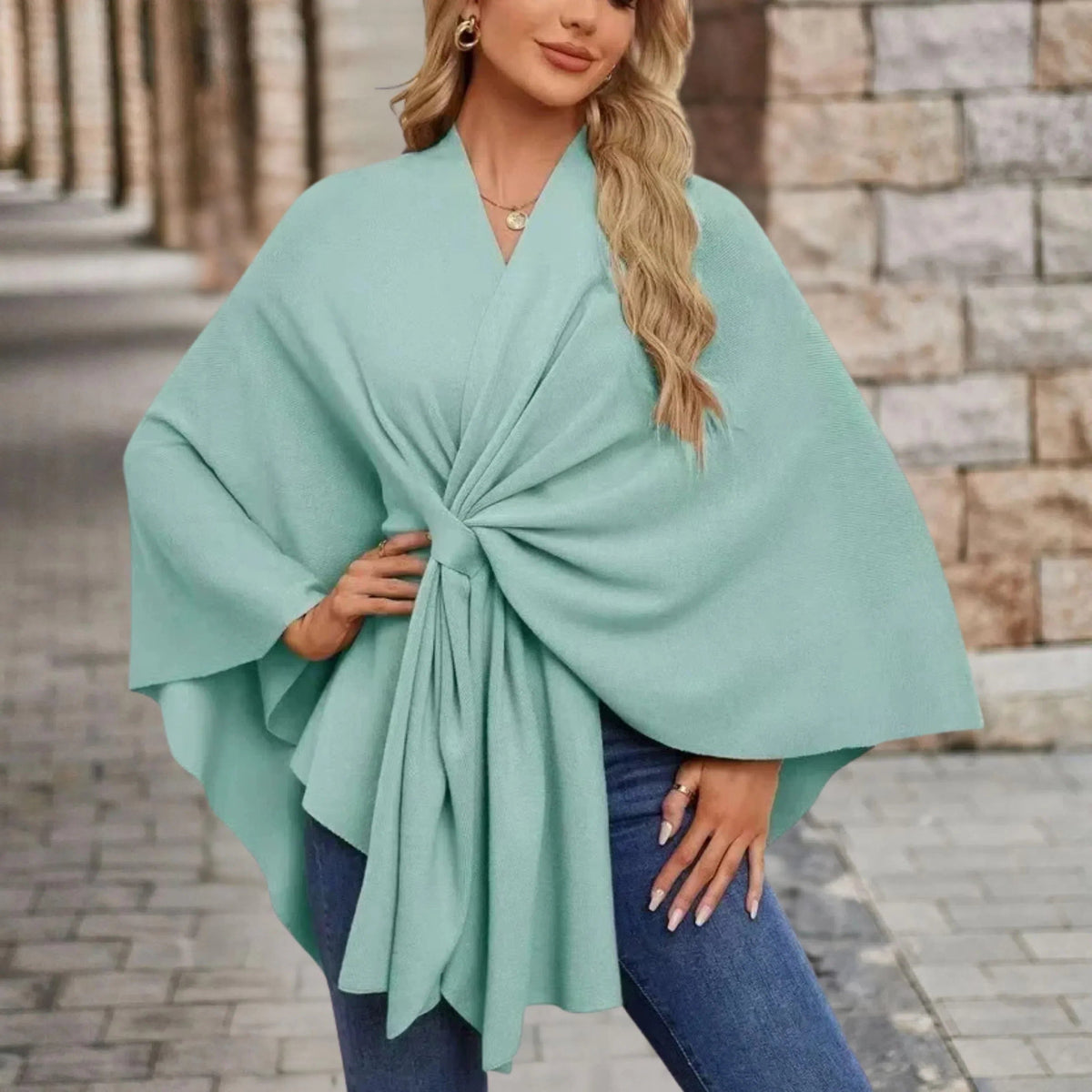 Gedrapeerde poncho met knoop aan de voorkant voor dames