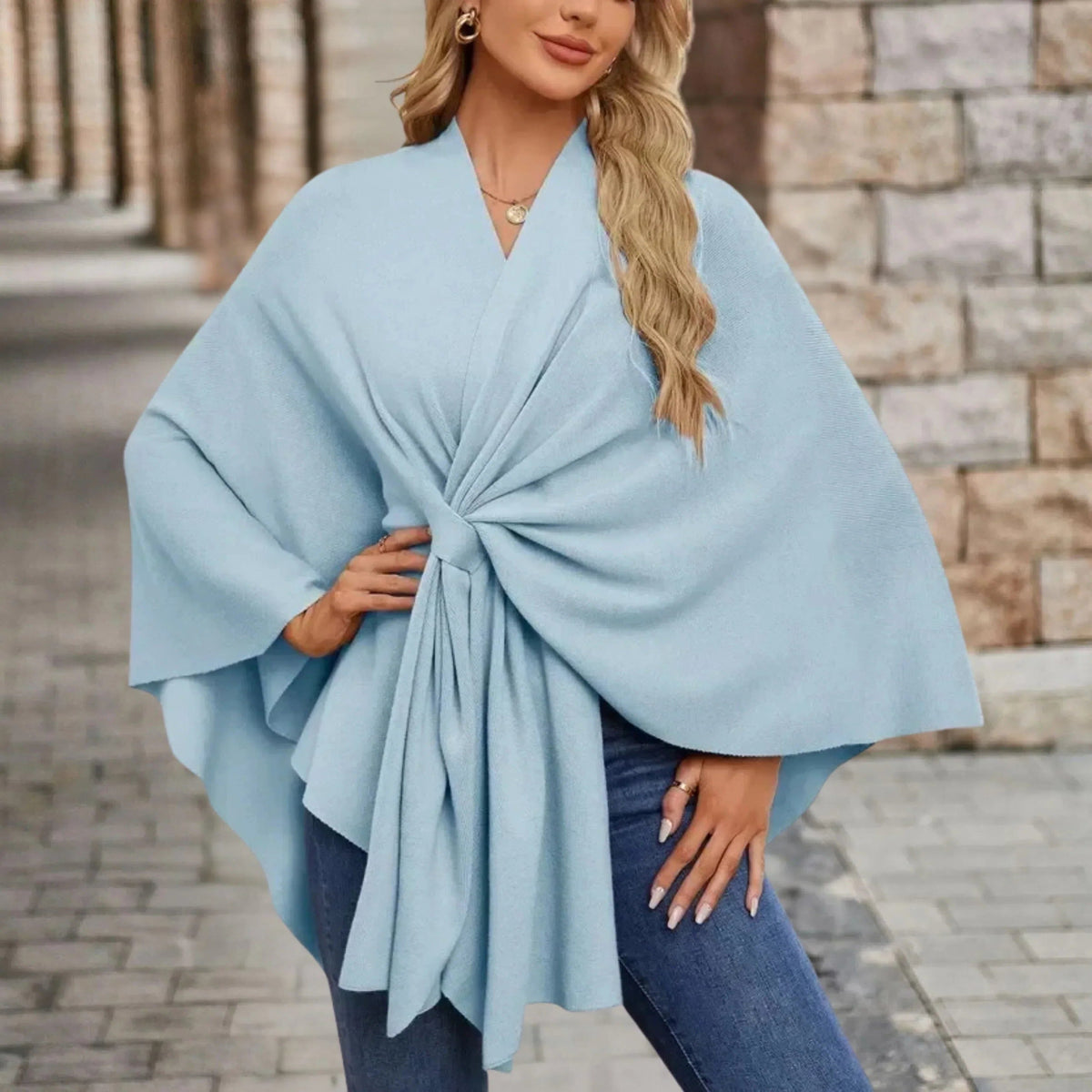 Gedrapeerde poncho met knoop aan de voorkant voor dames