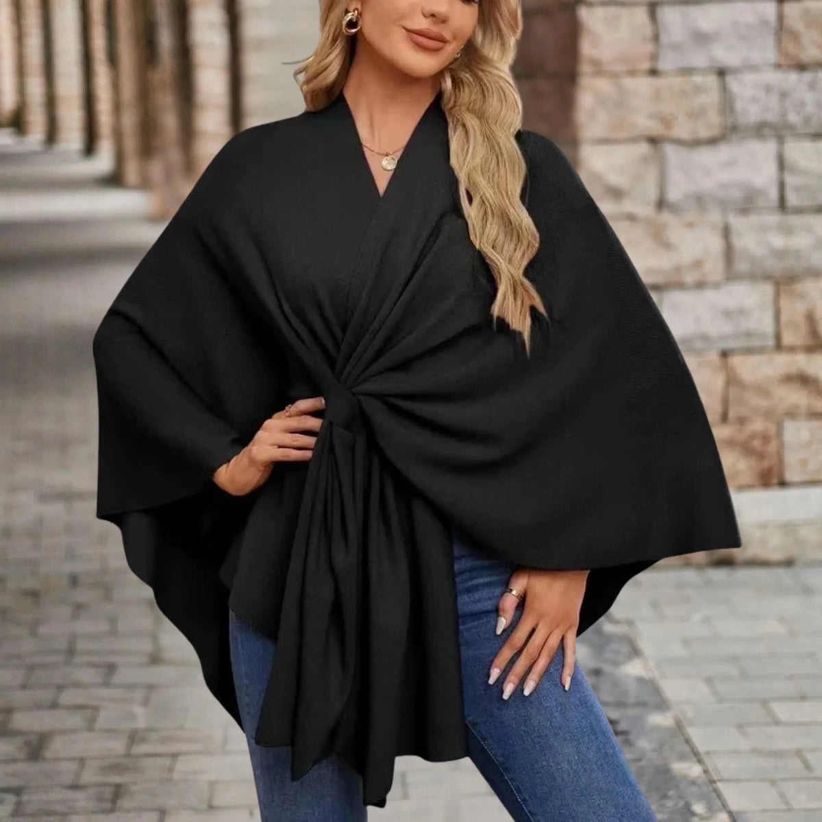 Gedrapeerde poncho met knoop aan de voorkant voor dames