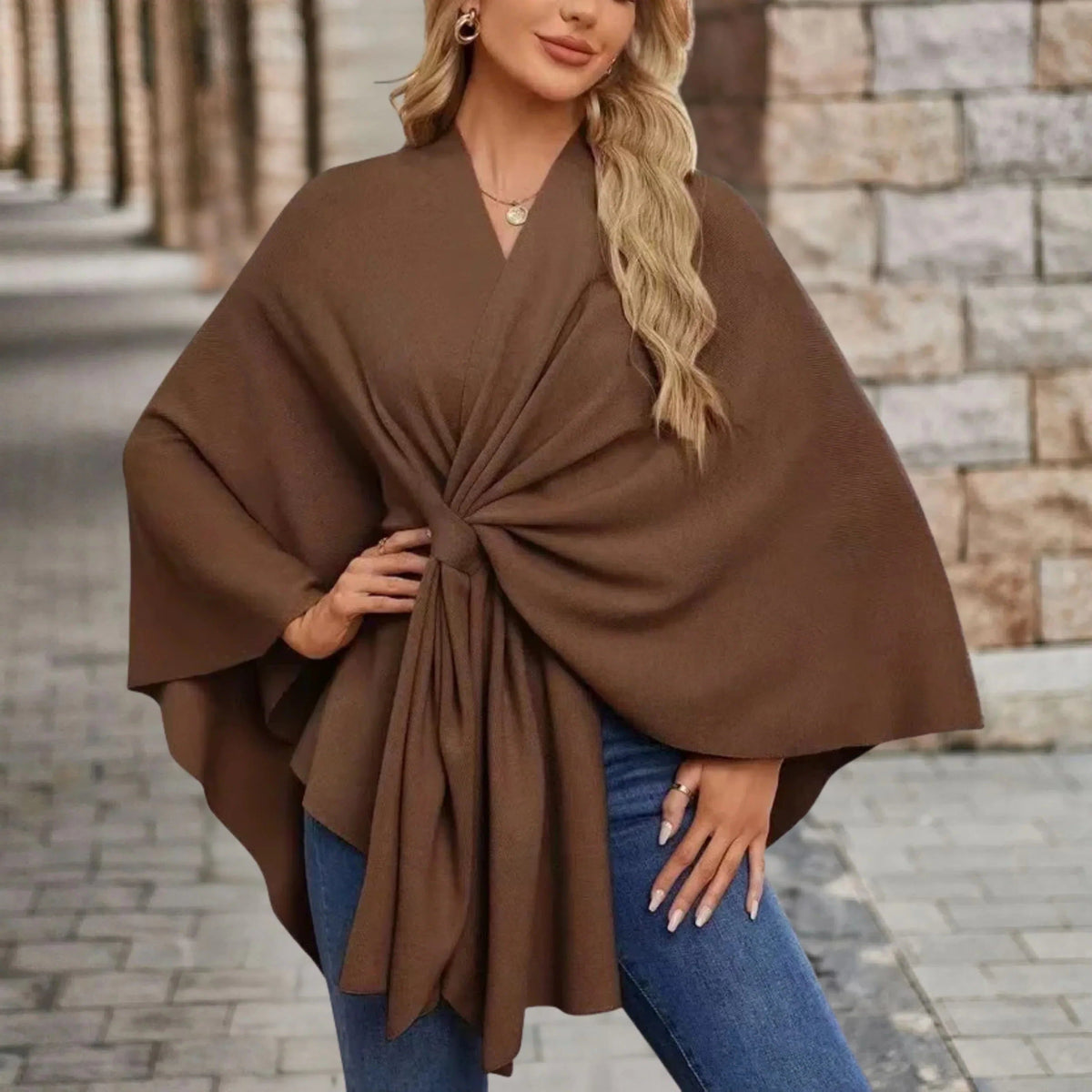 Gedrapeerde poncho met knoop aan de voorkant voor dames
