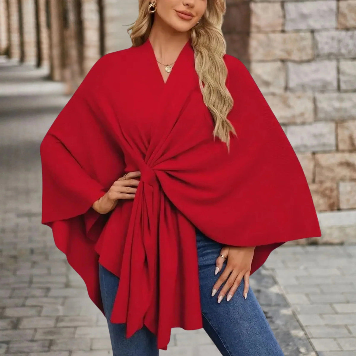 Gedrapeerde poncho met knoop aan de voorkant voor dames
