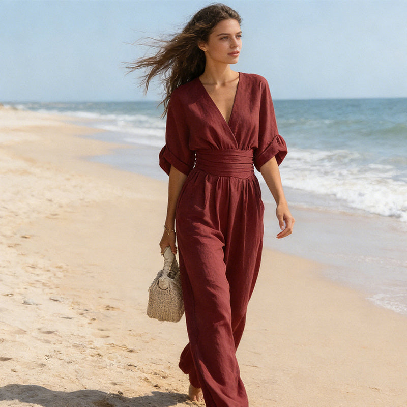 Elegante damesjumpsuit met wijde pijpen, V-hals en vloeiende pasvorm
