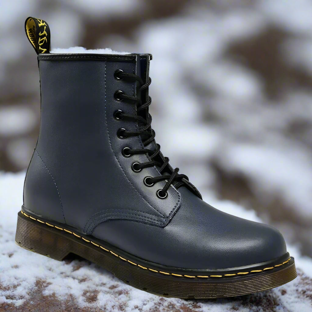 Elegant women's lace-up boots with durable leather, sleek design, and versatile style for comfort and sophistication.