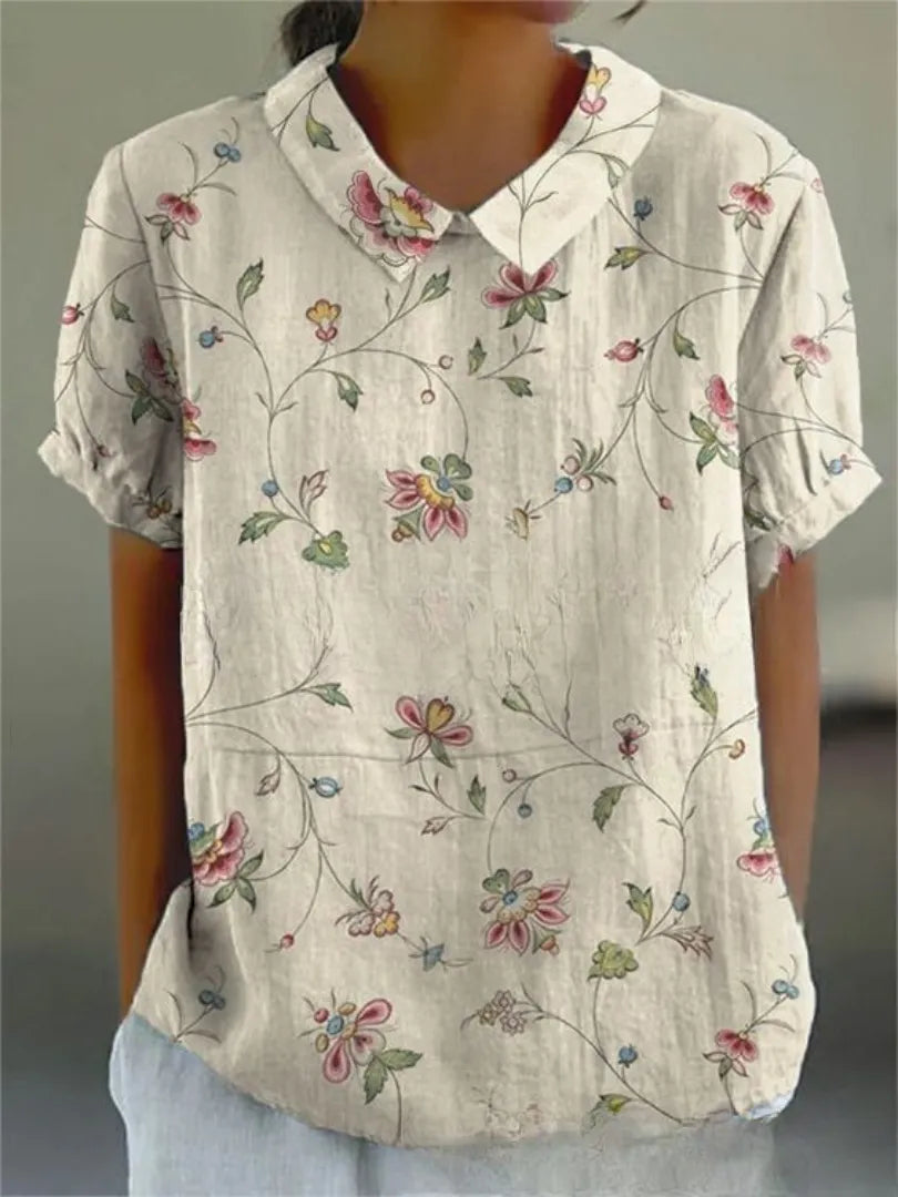 Damesblouse met geborduurde bloemen, kraag en korte mouwen