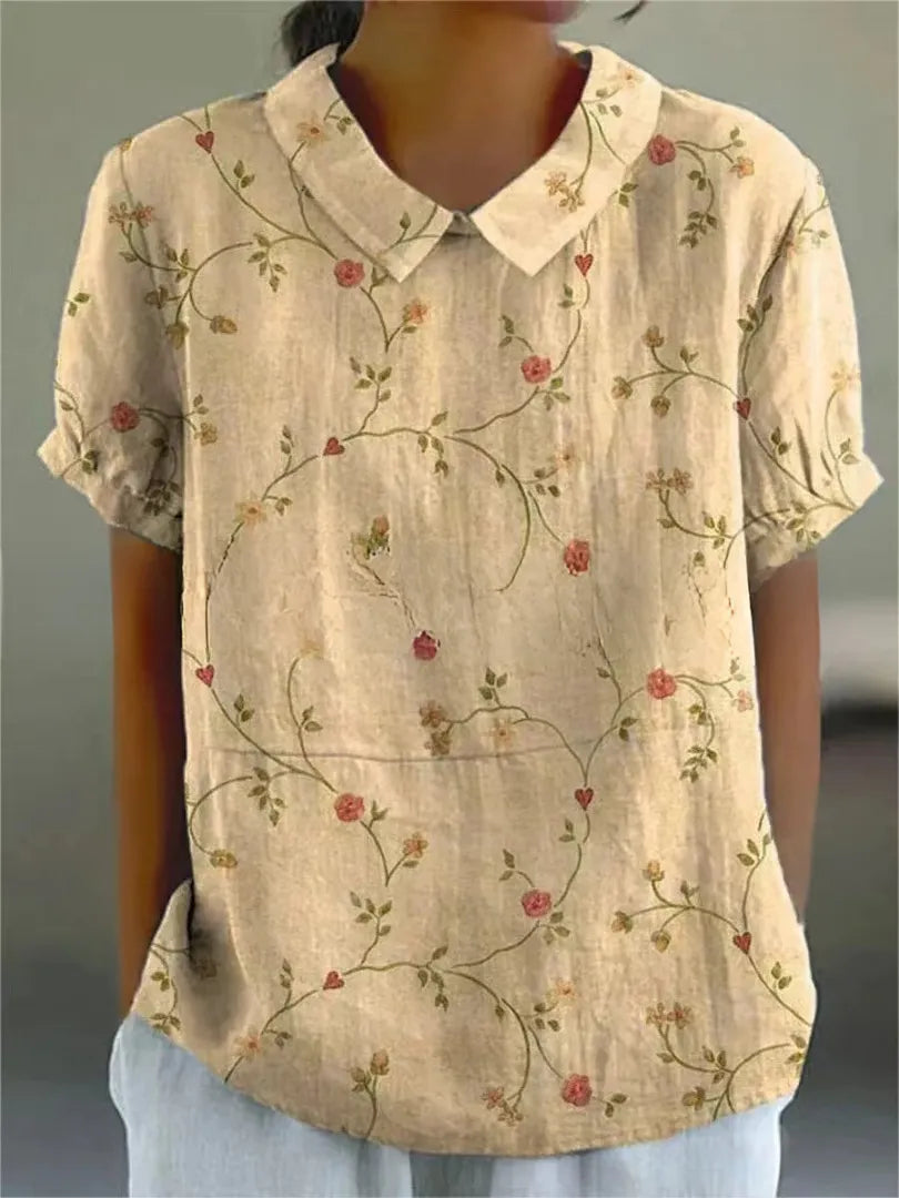 Damesblouse met geborduurde bloemen, kraag en korte mouwen