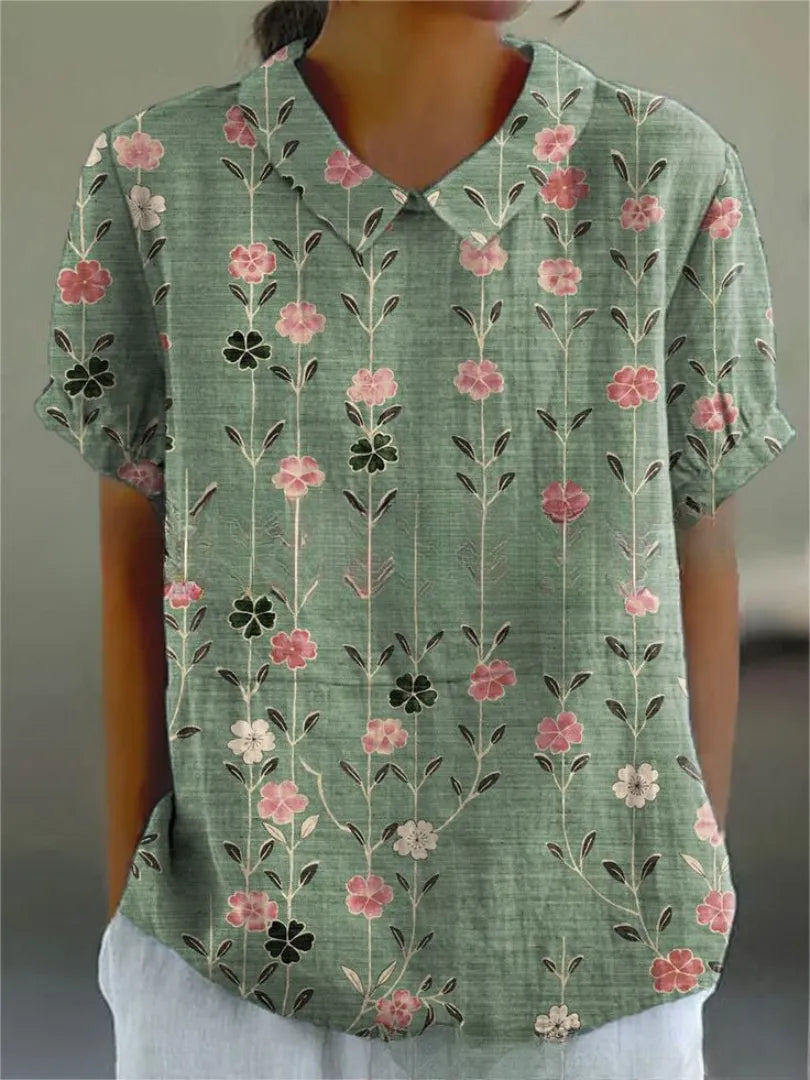 Damesblouse met geborduurde bloemen, kraag en korte mouwen