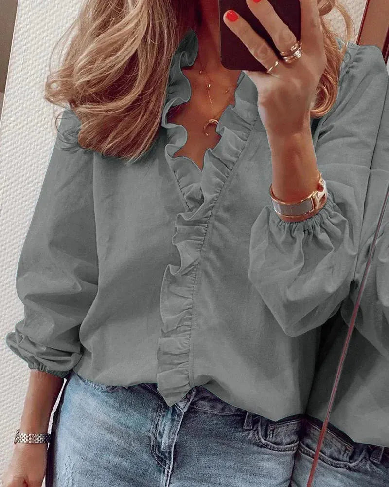 Enola damesblouse met ruches en knoopsluiting