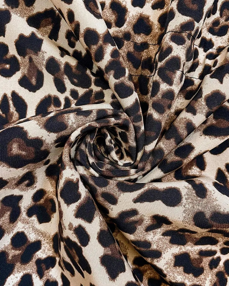 Farida omkeerbare damesjas met rits en luipaardprint
