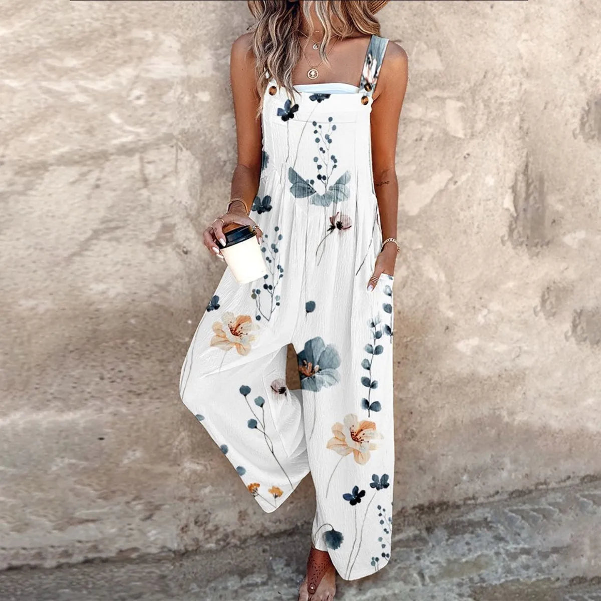 Mouwloze damesjumpsuit met bloemenprint, vierkante hals en wijde pijpen