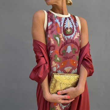 Elegante damesjurk met cape
