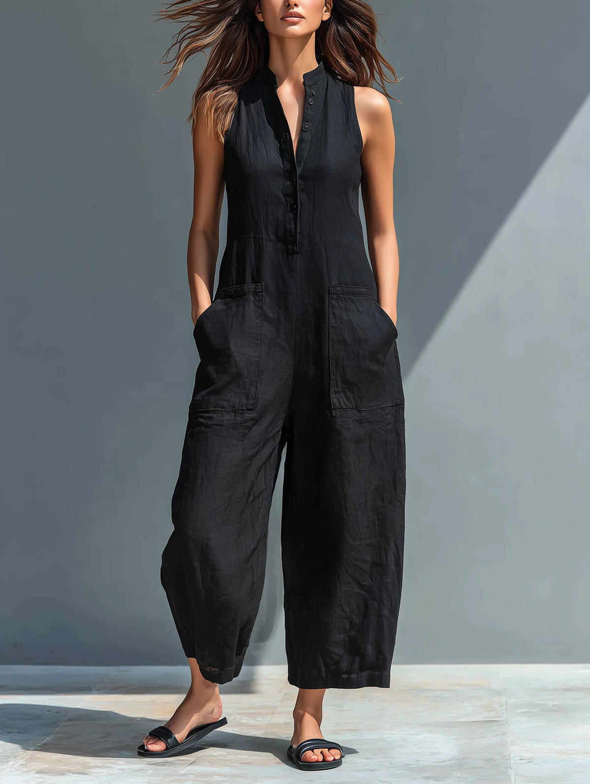 Lucinda mouwloze damesjumpsuit met wijde pijpen