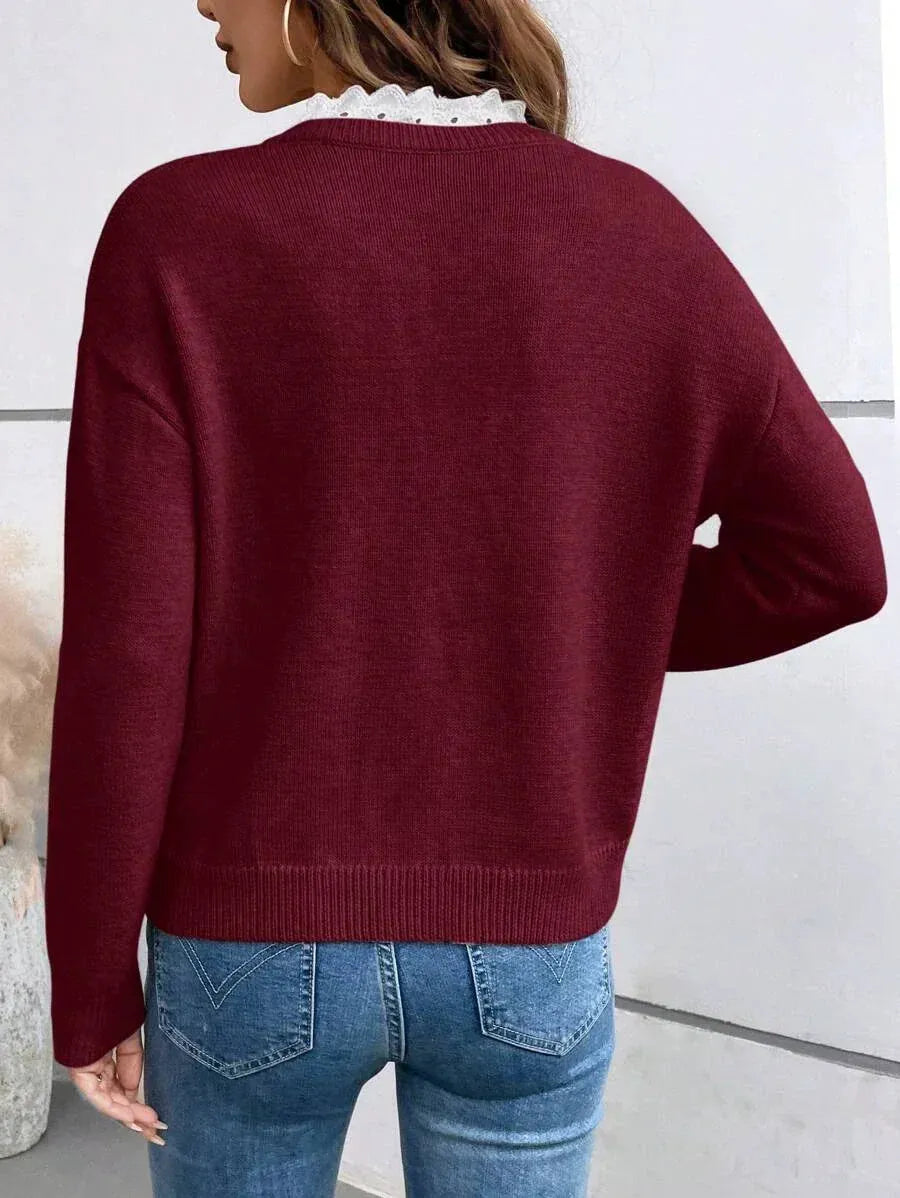 Maria geribde gebreide damesblouse met V-hals en kanten kraag
