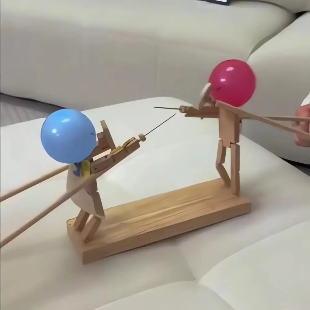 Partyspel ballonnenstrijd houten marionet schermhoofd