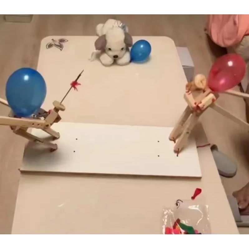 Partyspel ballonnenstrijd houten marionet schermhoofd