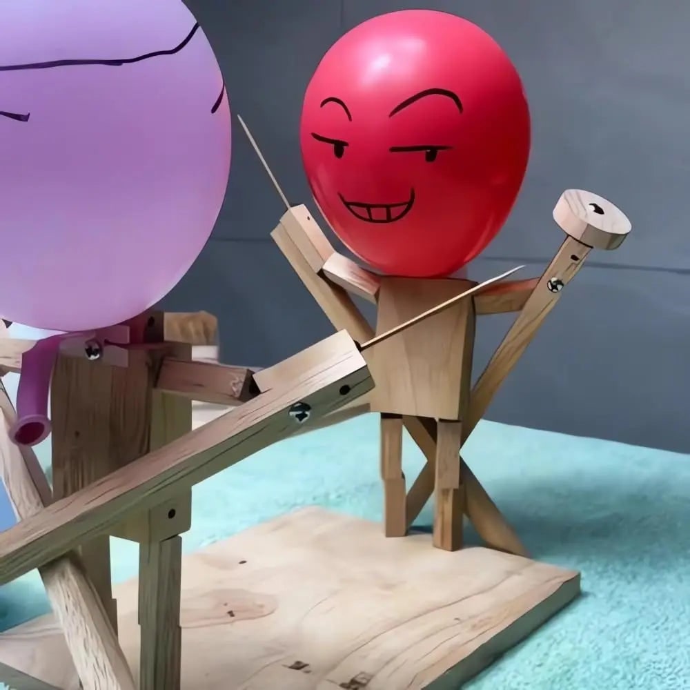 Partyspel ballonnenstrijd houten marionet schermhoofd