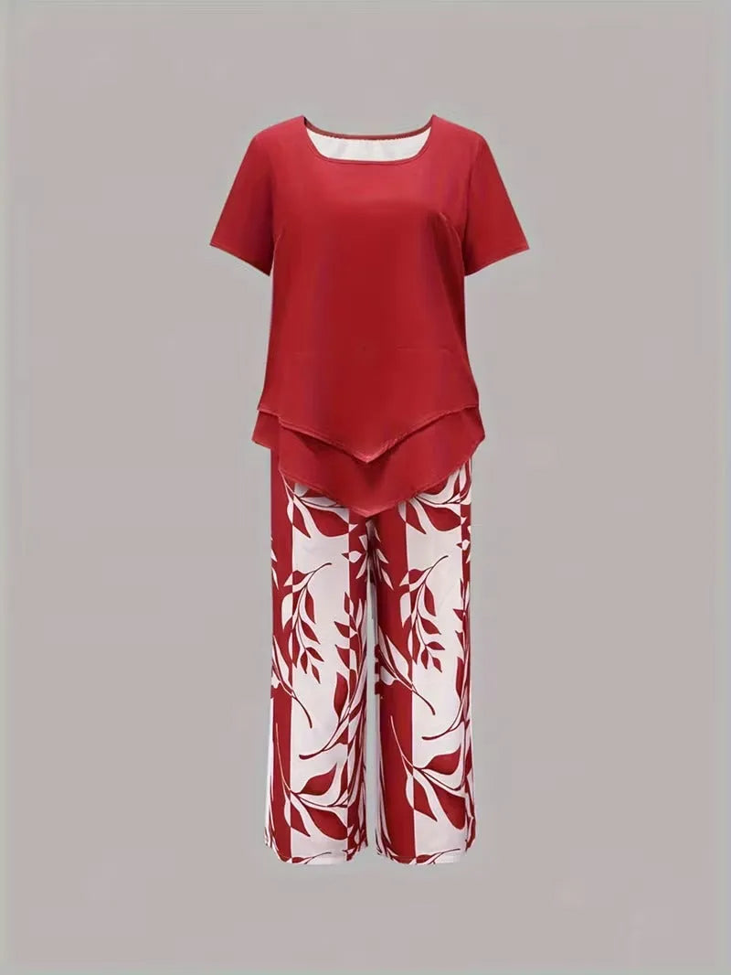 Primrose tweedelige damesset met verkorte capribroek en bladerenprint