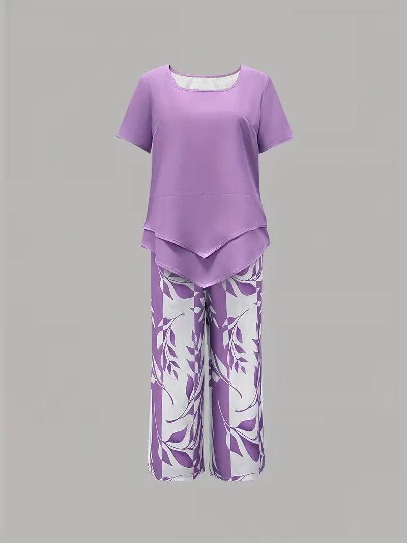 Primrose tweedelige damesset met verkorte capribroek en bladerenprint