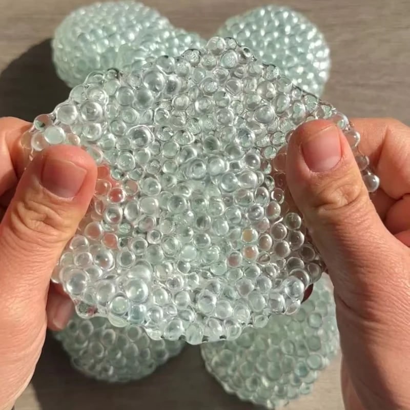 Sensorische stressbal, squishy dumpling fidgetspeeltje met gelkraaltjes en getextureerd oppervlak