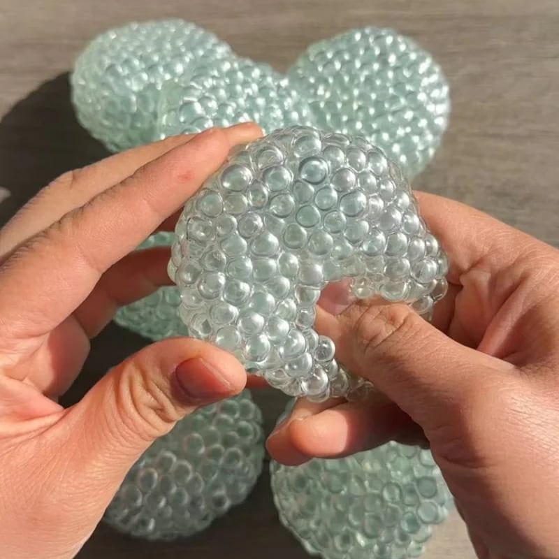 Sensorische stressbal, squishy dumpling fidgetspeeltje met gelkraaltjes en getextureerd oppervlak