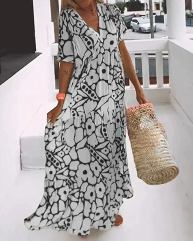 Soraya maxijurk voor dames met abstracte print en V-hals