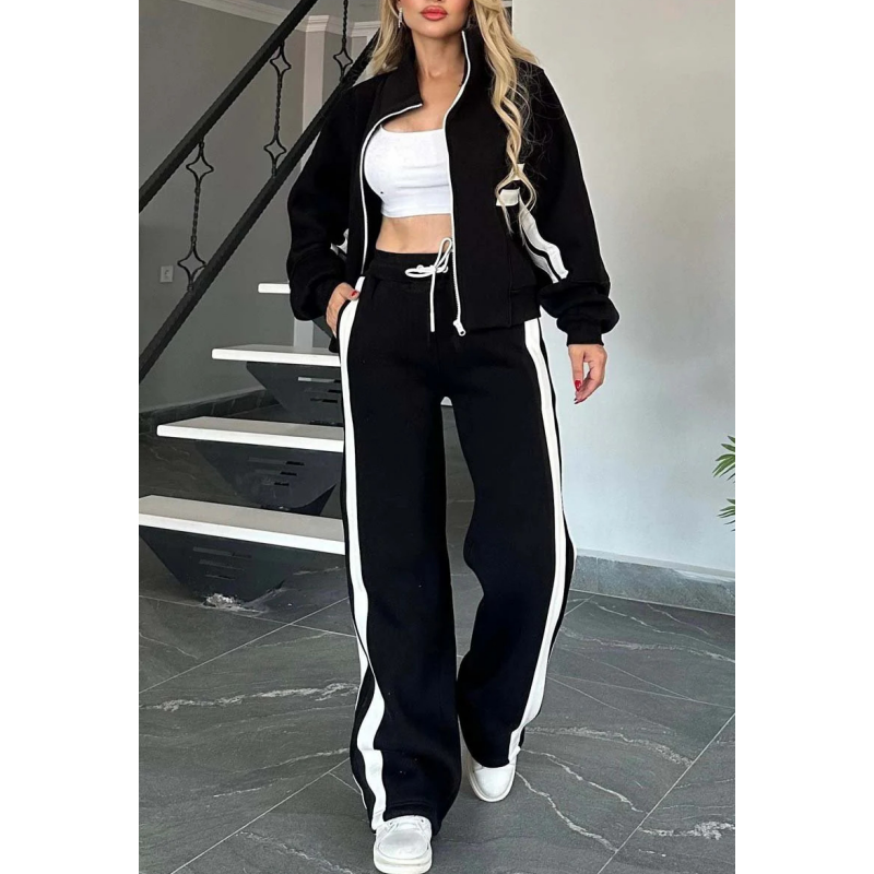 Vrijetijdsset voor dames met vest met rits en broek met wijde pijpen en contraststrepen