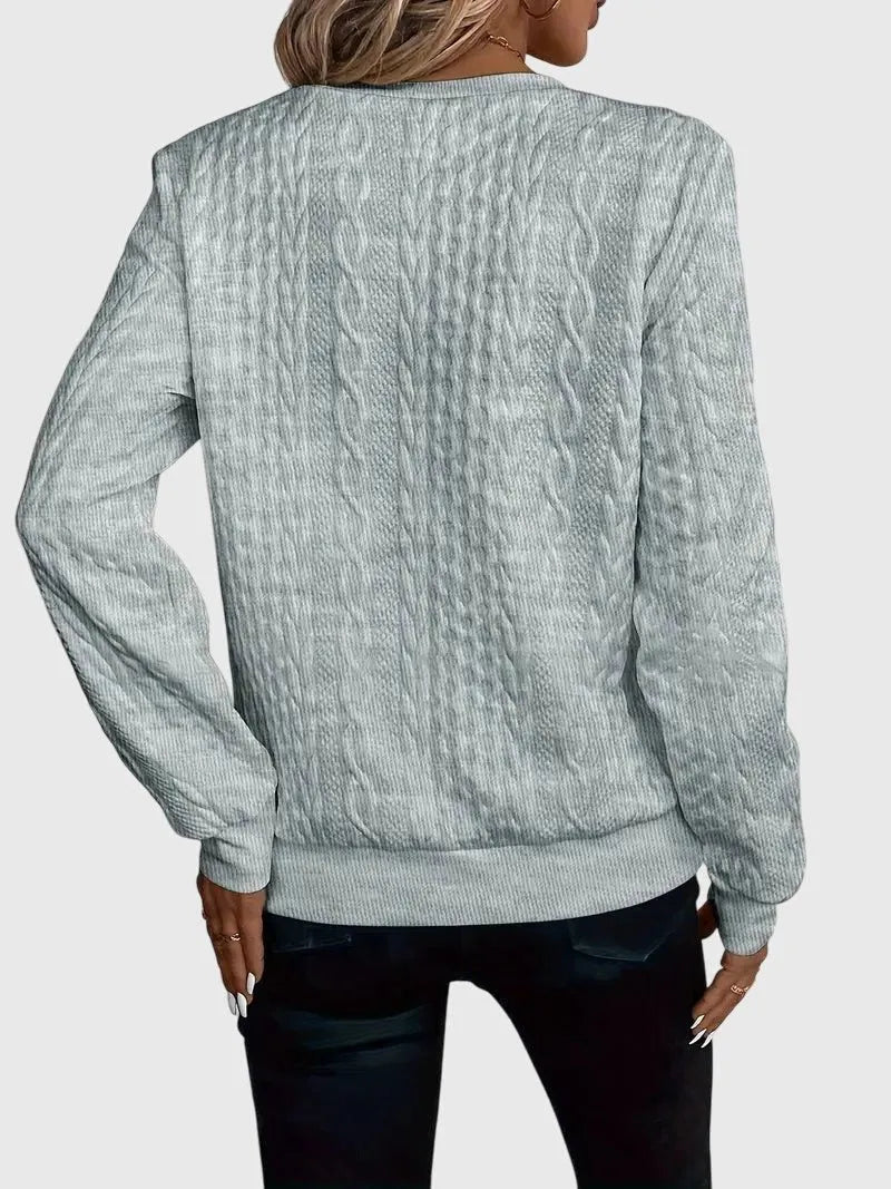 Kabelgebreide damessweater met ritssluiting